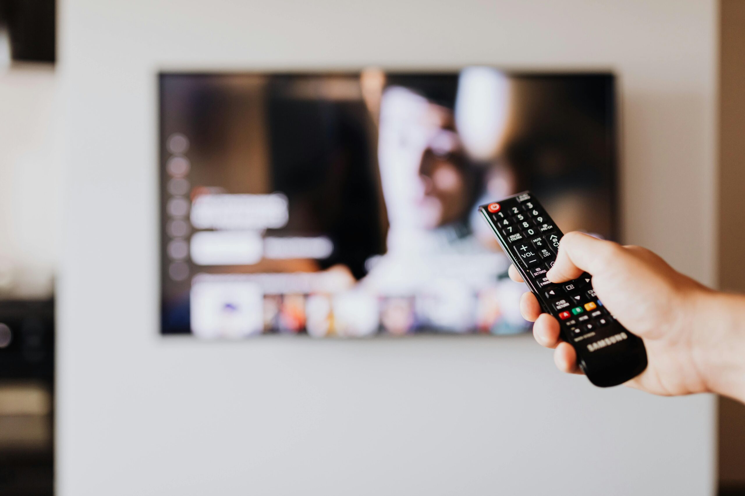 Modern living room featuring cable tv software interface on TV screen