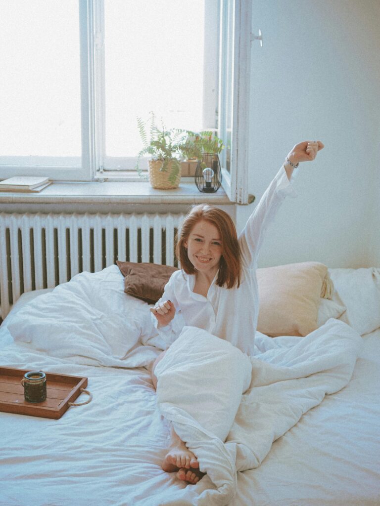 Person doing light home exercise in a bright living room